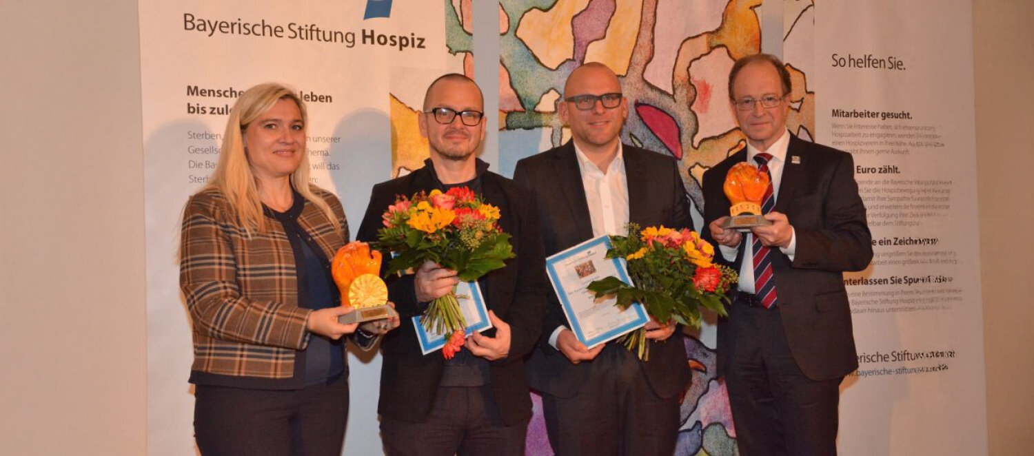 Preisverleihung auf einer Bühne